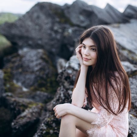 Young,Brunette,Girl,Portrait,Outdoors,In,Grey,Mountains,Outdoors.,Woman